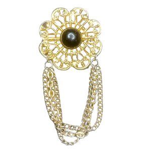 Brooch w. black cabochon in gold tone